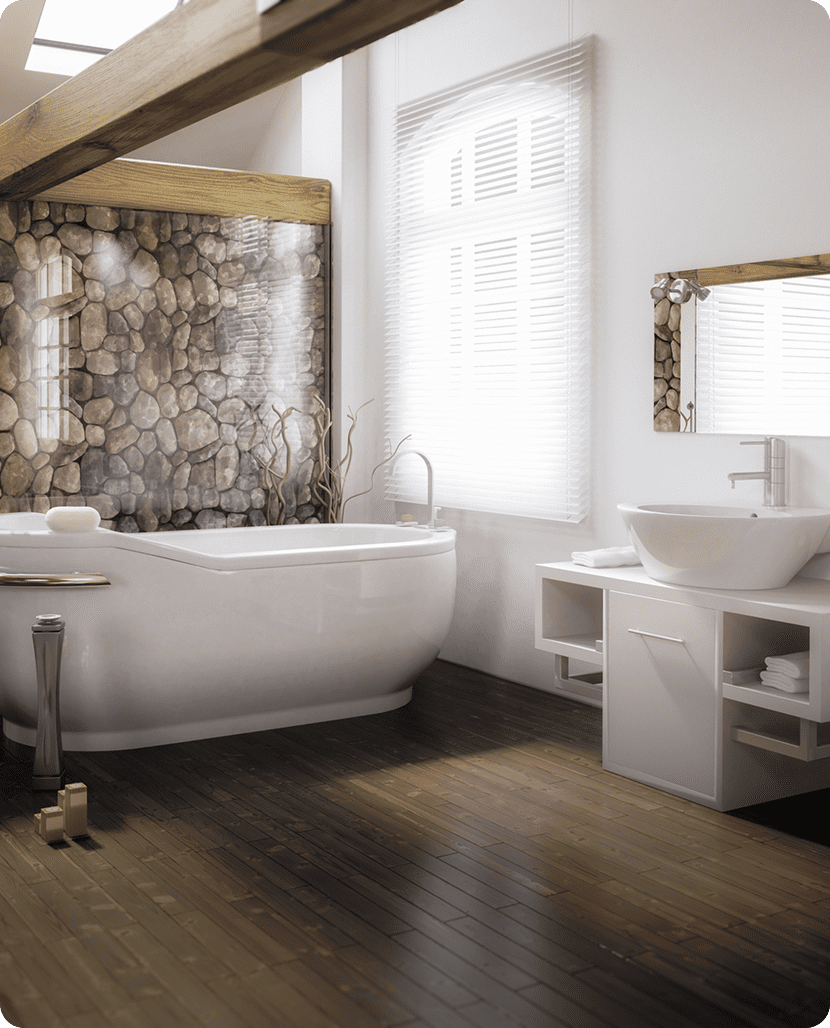 Modern bathroom with tub and stone wall.