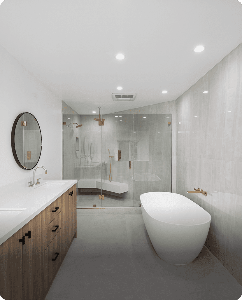 Modern bathroom with tub and glass shower.