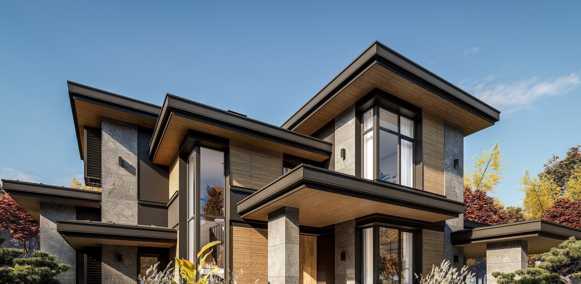 Modern house with large windows and trees.